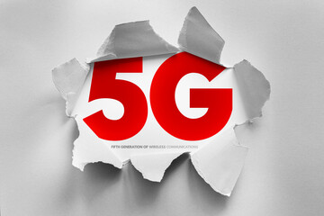 Striking 5G acronym for Fifth Generation of Wireless Communications revealed behind torn paper, symbolizing cutting-edge mobile technology, ultra-fast data speeds, and next-gen connectivity
