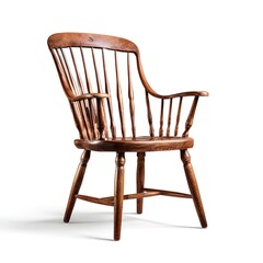 Antique wooden windsor armchair with spindle back and turned legs on a white background