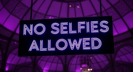 Prohibition Sign of Selfies in a Lit Venue Illuminated With Dramatic Neon Purple Lights