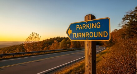 Scenic Parking Turnaround Sign on a Winding Road with a Beautiful Sunset Backdrop
