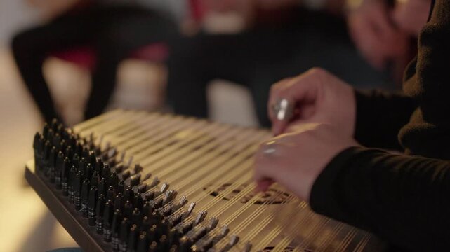 Hands Playing the Traditional Turkish Kanun