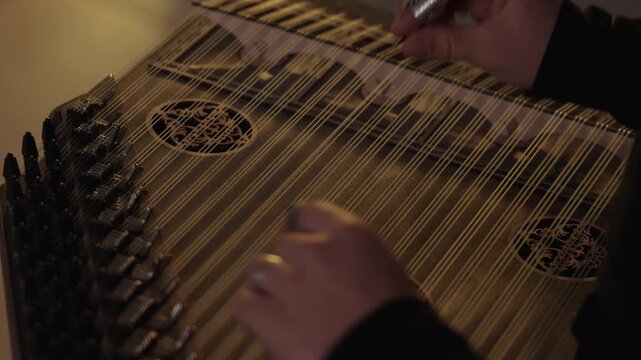 Hands Playing the Traditional Turkish Kanun