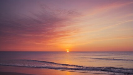 Fototapeta premium Serene beach sunset with pastel hues reflecting on gentle waves and wet sand