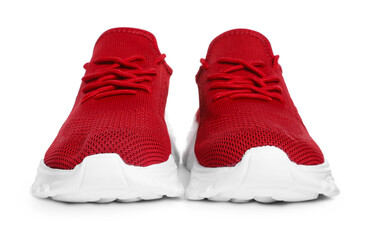 Pair of stylish red sneakers isolated on white