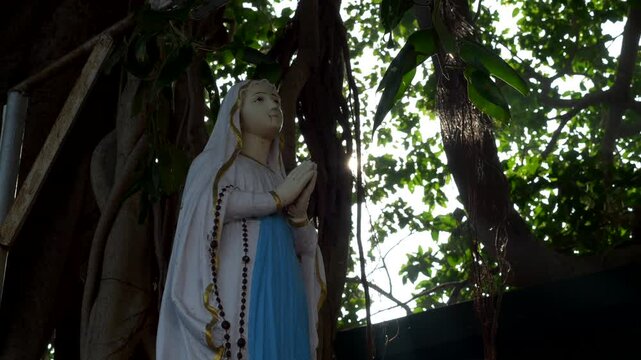 India. Chennai. 05-14-2022. Statue of the Madonna on St. Thomas Mount. Backlights. Video 4K