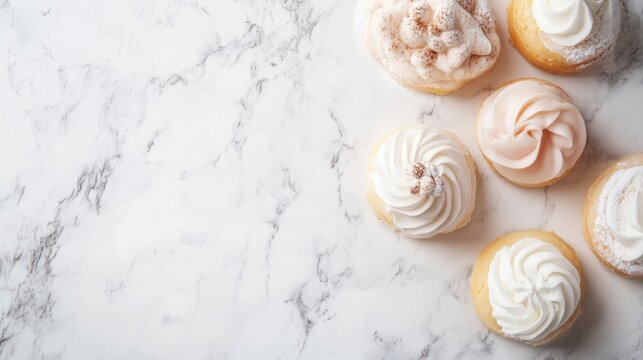 Marble table displaying a variety of different types of doughs for baking and cooking