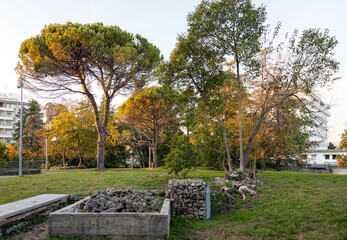 Ancient stone structures linked to historic thermal springs inside Parco Montirone, Abano Terme, Italy