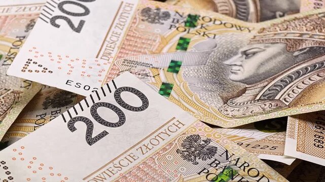 Polish zloty banknotes, money background. Finance and economy in Poland