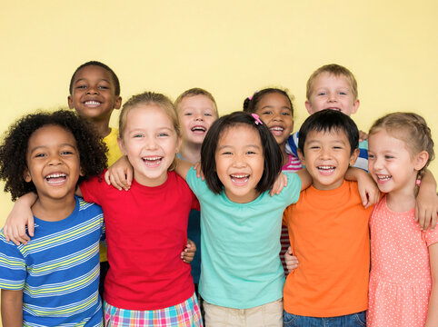 Large group of happy multiethnic kids standing together hugging smiling camera childhood diversity friendship education school classmates celebrating world children day fun joy colorful t-shirts  - Powered by Adobe