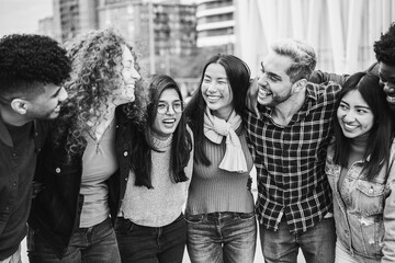 Young multiracial young people having fun outdoor laughing together - Diversity and lifestyle...
