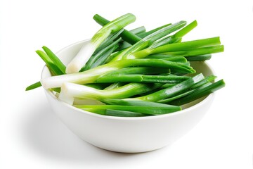 Fresh green onions in a white bowl