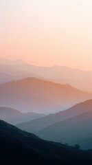 Fototapeta premium mountain landscape with sunrise and misty valleys, close-up shot, warm earthy hues, premium look, natural daylight, ample space for text, brand-safe, no logos