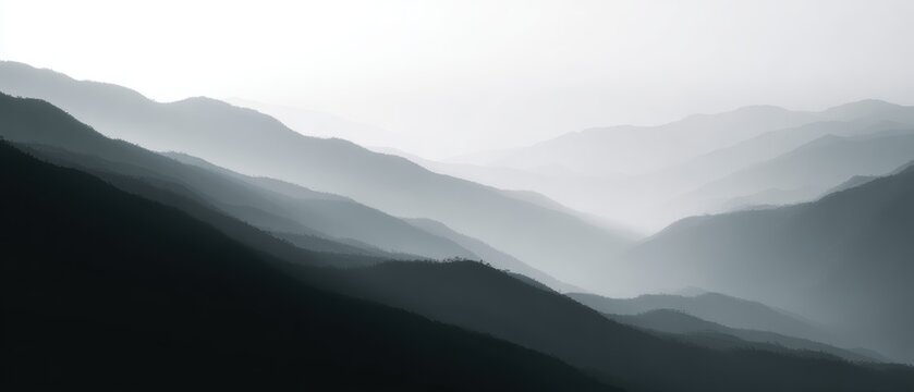 mountain landscape with sunrise and misty valleys, top view, monochrome palette, premium look, soft diffused glow, minimal composition, generic props only