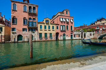 Gondolas on a canal in Venice