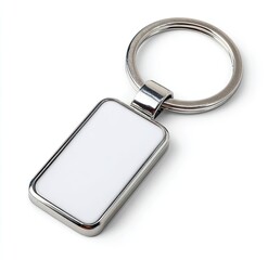 Rectangular, metallic keychain with a blank, white, enamel-like surface.  A simple, silver-toned metal keyring