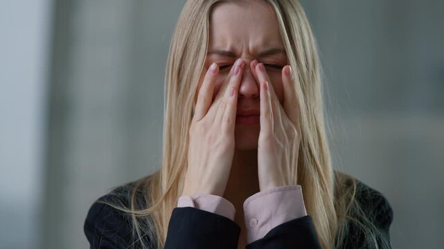 Portrait Caucasian business woman feeling discomfort in nose allergy eyes pain ache rubbing face businesswoman female girl suffer sneezing in office company health problem medicine trouble sneeze