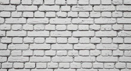 Fototapeta premium Textured, white-painted brick wall with staggered pattern, close-up
