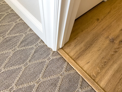 Trim detail on carpet and laminate floor transition