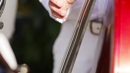 Music performance showcases skilled hand on bass
