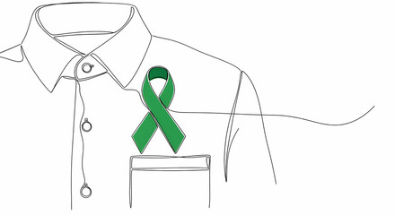 Green ribbon on shirt pocket representing support and awareness  