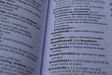 Close Up Of English Definition Dictionary Page Word Of - broadcloth