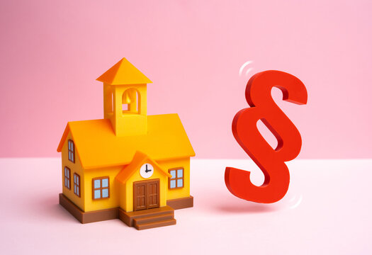 School and the paragraph symbol. Laws and regulations in educational institutions. School statute. Education policy, school management and student rights.