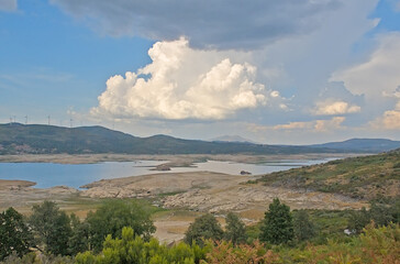 Rabagao river and surrounding mountains with high cumulus clouds, Viade de Baixo, Montalegre, Portuga