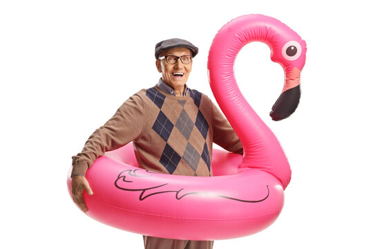 Elderly man with a big pink inflatable flamingo rubber ring