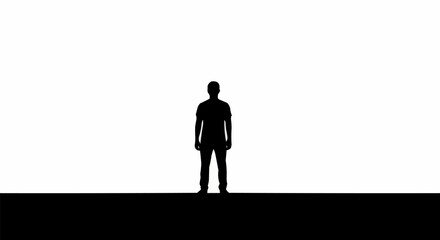 Silhouette of a person standing alone against a bright background. © Wir