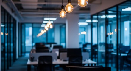 Office interior with hanging light bulbs