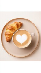 Cozy Coffee with Croissant and Heart Shape Latte Art on Plate