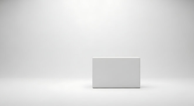 Minimalist white rectangular block on seamless studio background display.