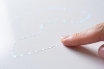 Index Finger Touching Dotted Line on White Background Showing the Technology and Connection Concept for Future Business Growth