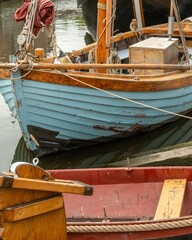 Fototapeta premium Old wooden boats moored at a rustic pier