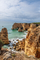 View of Praja da Marinha, Portugal with its characteristic rock formations