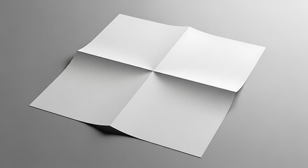 Empty white sheet of paper with eight creases, perfect for mockups, brochures, or informational layouts on a grey surface