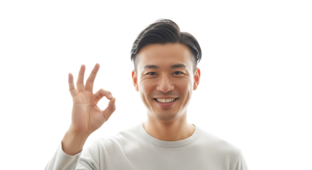 Smiling asian man showing okay sign isolated on transparent background portrait of a cheerful person giving approval with hand gesture