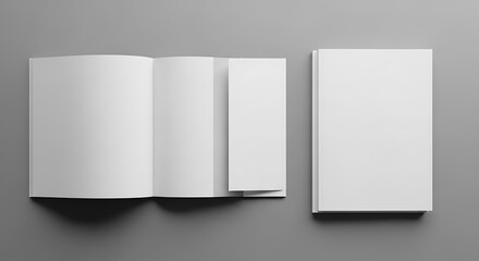 Naklejka premium Mockup of blank white brochure, booklet, and book on a neutral grey background, perfect for showcasing design and branding projects