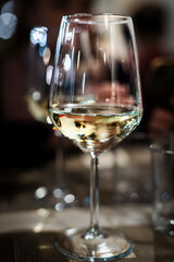 A glass of white wine.