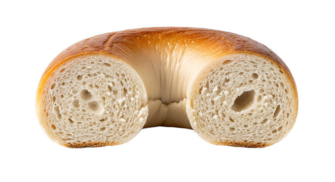 Closeup of a bagel cut in half isolated on transparent background, a bread product made of dense dough that is boiled and then baked