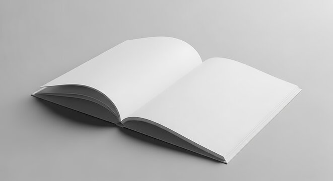 Open blank book or magazine with white pages, lying flat on a light gray surface, ready for custom content or design mockups, clean presentation