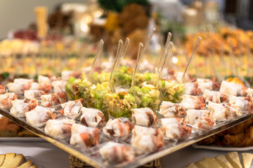 Catering buffet in Northern Italy characterized by presence of typical products like cottage cheese, lard, anchovies and salami.