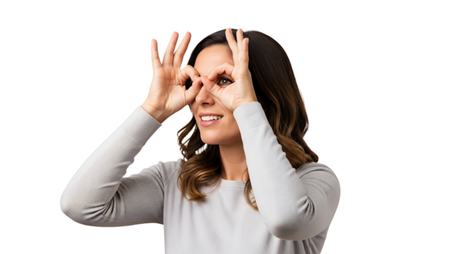 Young woman making binoculars gesture with her hands isolated on transparent background happy girl looking through fingers binoculars with a smile expression