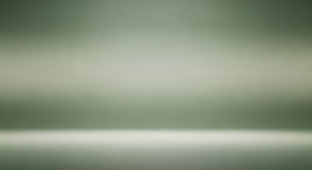 Subtle green gray gradient backdrop with blurred surface studio background