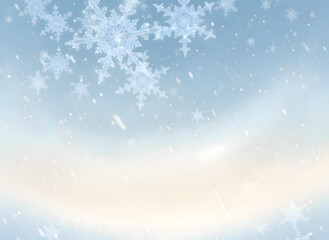 Soft focus winter background with falling snowflakes and gentle light