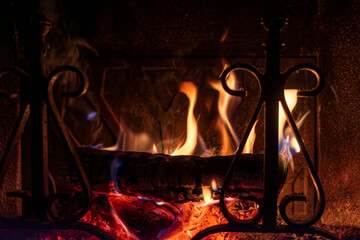 Flames into an old fireplace in Europe.