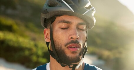 Thinking, man and cyclist in nature for fitness, training or break for sports workout on mountain. Helmet, ideas and male athlete with rest for cycling practice or exercise outdoor for wellness. - Powered by Adobe