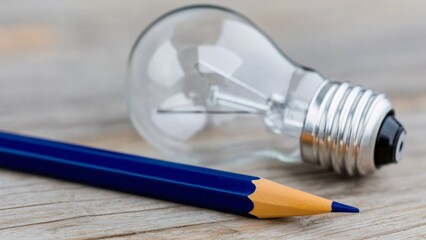 Pencil and Lightbulb Representing Imagination and Ideas