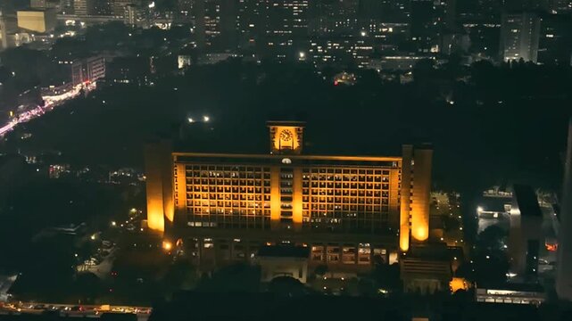 Aerial view of illuminated building in dhaka at night, bangladesh