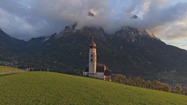 Aerial of Church San Valentino near Alpe di Siusi, Dolomites, Italy.